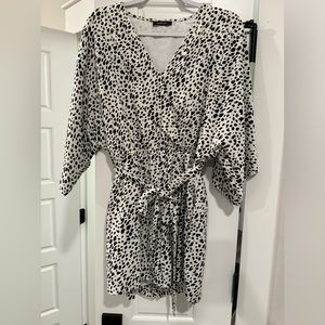 Amazon Cheetah Romper Size Medium not rips or stains